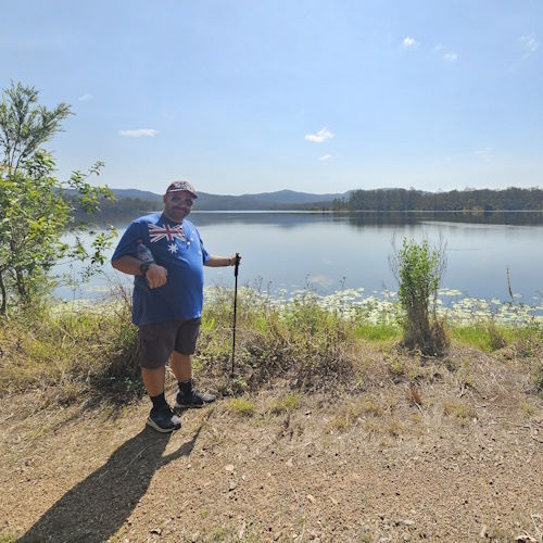 Person in front of Lake Manchester in Brisbane working on fitness.